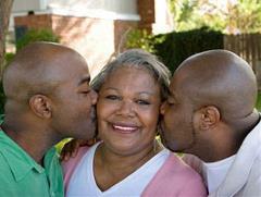 Two sons with their mom.