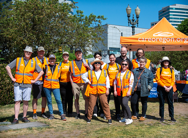 CareOregon Team photo wearing orange vests at the Solve Cleanup event 2023
