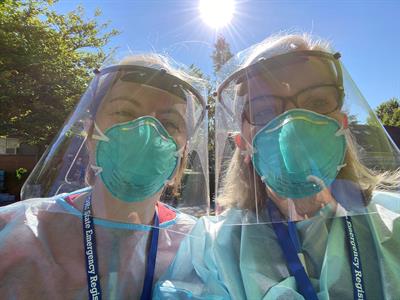 Rachel Jean, RN and Mary Engrav, MD masked and shielded for COVID vaccine drive